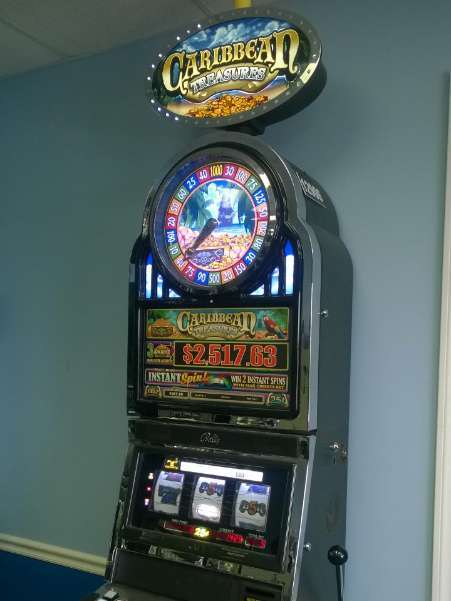 BALLY CARIBBEAN TREASURES WITH TOP BONUS MONITOR AND BONUS WHEEL