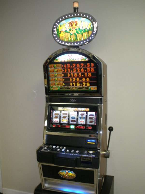 BALLY HEE HAW S9000 SLOT MACHINE WITH TOP BONUS MONITOR AND LIGHTED TOPPER