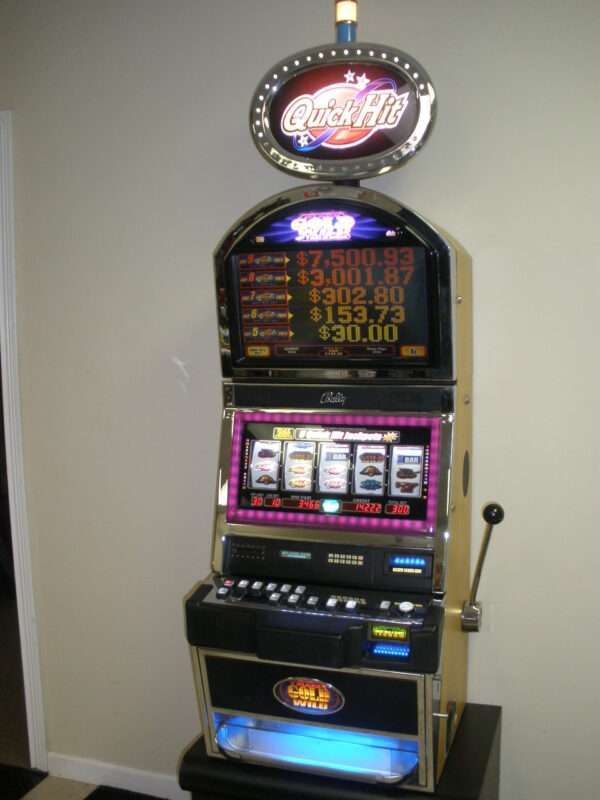 BALLY QUICK HIT BLACK GOLD WILD JACKPOT S9000 SLOT MACHINE WITH TOP BONUS MONITOR AND LIGHTED TOPPER