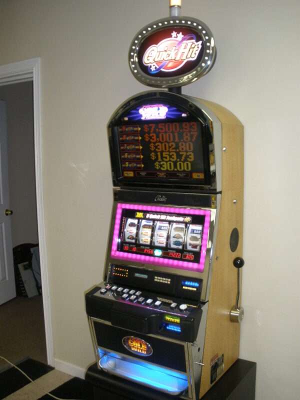 BALLY QUICK HIT BLACK GOLD WILD JACKPOT S9000 SLOT MACHINE WITH TOP BONUS MONITOR AND LIGHTED TOPPER