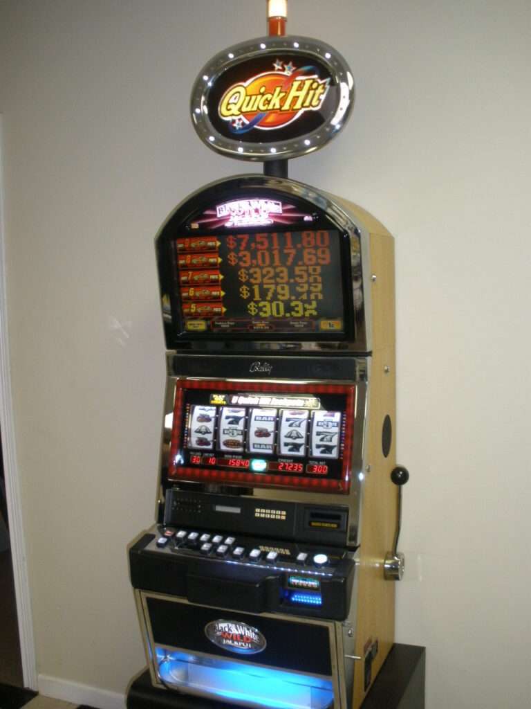 BALLY QUICK HIT BLACK & WHITE JACKPOT S9000 SLOT MACHINE WITH TOP BONUS MONITOR AND LIGHTED TOPPER